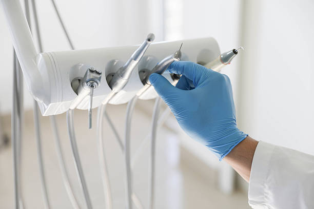 Professional Dental Implants technician working in Mitchell County County, IA